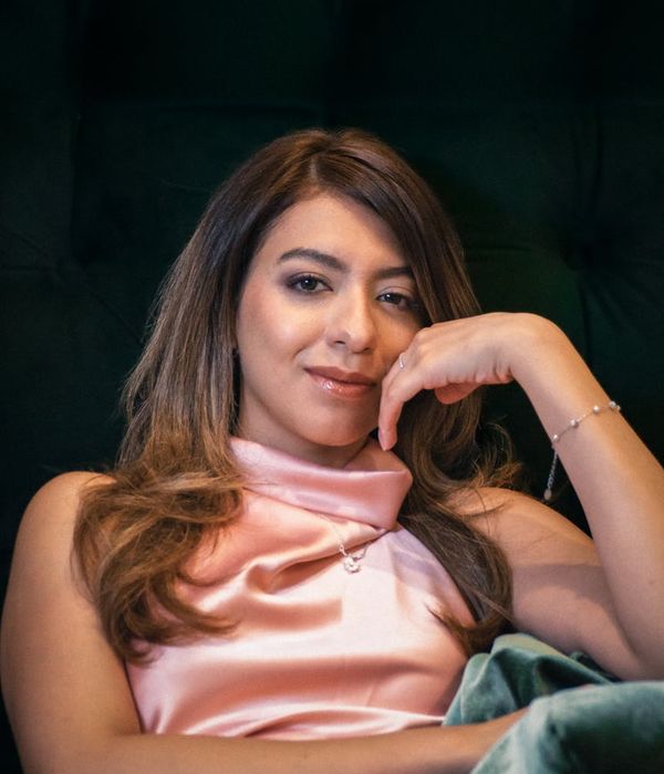 Portrait of a smiling woman looking confident and relaxed